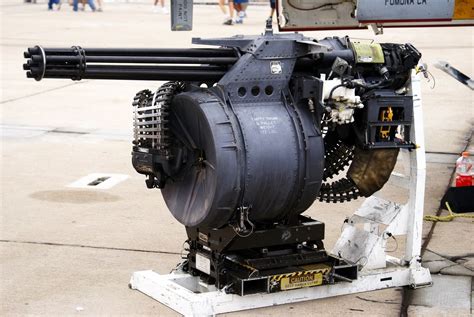 an old engine sitting on top of a stand with the caption can you name ...