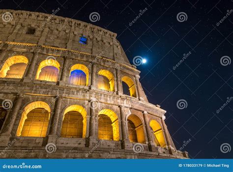 Roman Colosseum at Night Under Full Moon and Starlight in Rome, Italy ...