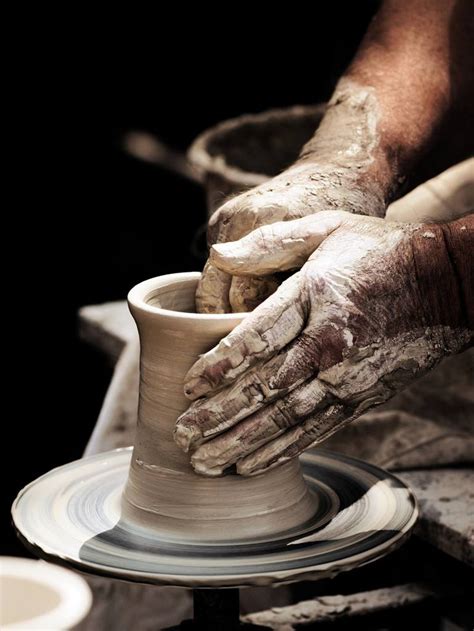 Potters Hands turning a beaker on potter wheel. Photography by A Frost ...