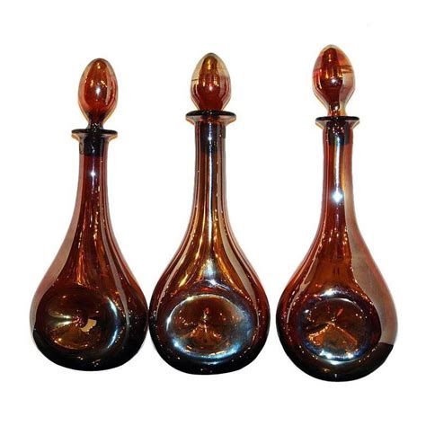 Set of Three Iridescent Glass Bottles For Sale at 1stdibs