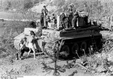 Crew of a Tiger I, Panzer Abteilung 502, taking care of personal ...