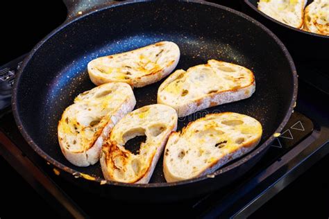 Toasting Bread in a Large Skillet. Cooking Food at Home and Outdoors ...