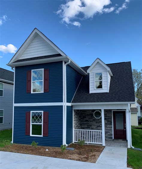 dark blue vinyl siding house - odellbeckhammemes