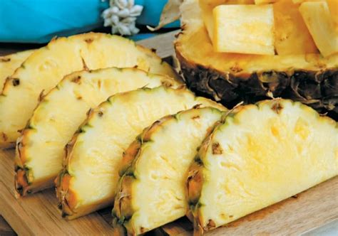 Fresh Pineapple Slices on Table - Prepared Food Photos, Inc.