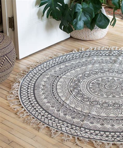 This round, boho rug is the perfect addition to any small space! Use it ...