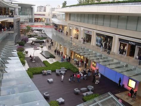 an overhead view of people walking around in a shopping mall with ...