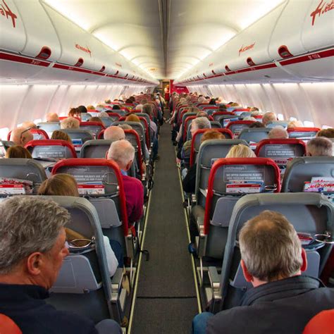 Interior Of A Jet2 Aircraft Cabin With Passengers Allocated To Their ...