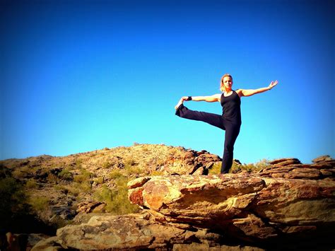 Woman Doing Balancing Yoga Pose. Extended Hand To Big Toe Yoga Pose