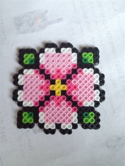 Jewelry making #perler #beads #flower perler beads flower, perler beads ...