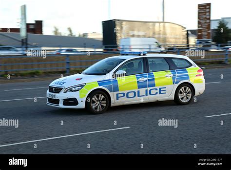 West Midlands Police car travelling in Birmingham city, UK Stock Photo ...