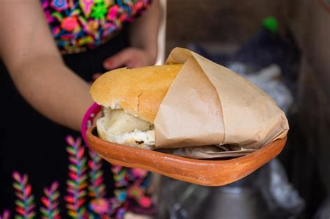 Premium Photo | Unrecognizable woman with a traditional mexican torta ...