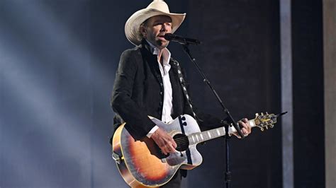 The Meaning of Toby Keith's 'Don't Let the Old Man In'