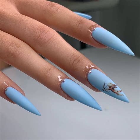 Pin by Alexandra on nailed it | Angel nails, Blue stiletto nails ...