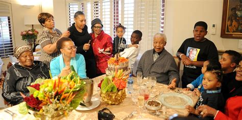 Nelson Mandela celebrating his 94th birthday with members of his family ...