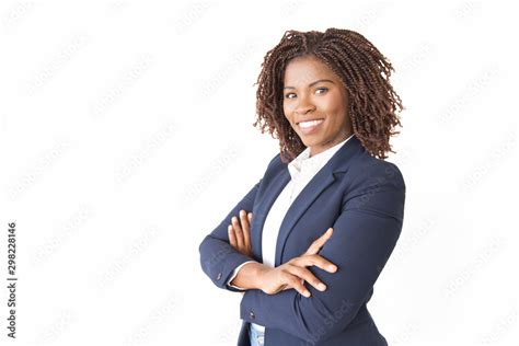 Happy successful female professional smiling at camera. Young African ...