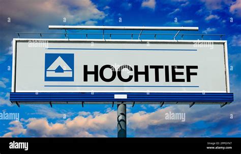 Advertisement billboard displaying logo of Hochtief Stock Photo - Alamy