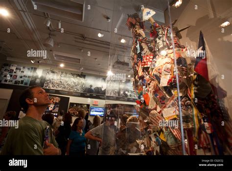 Statue of Liberty covered with photos, notes and flags that appeared by ...