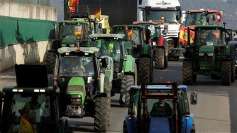 Spanish farmers block highways to protest European Union regulations ...