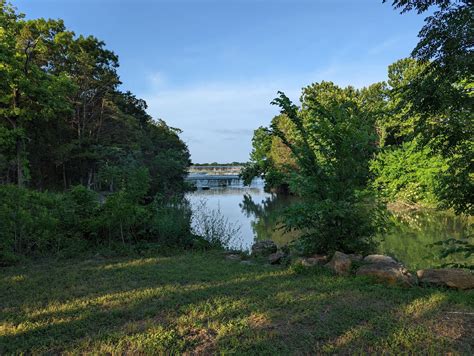 The white rock lake trail in texas leads you around a beautiful body of ...