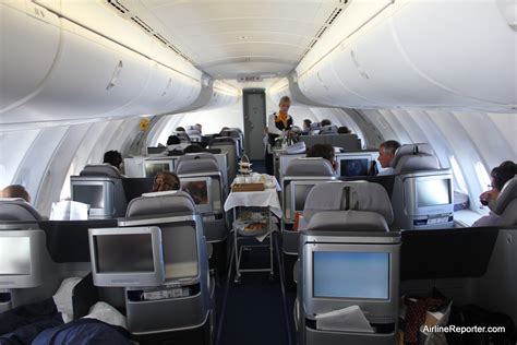 Flying Business Class on the Upper Deck of a Lufthansa Boeing 747-8I ...