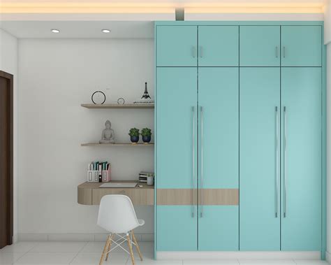 Modern Aqua-Blue Wardrobe Design With Attached Study | Livspace