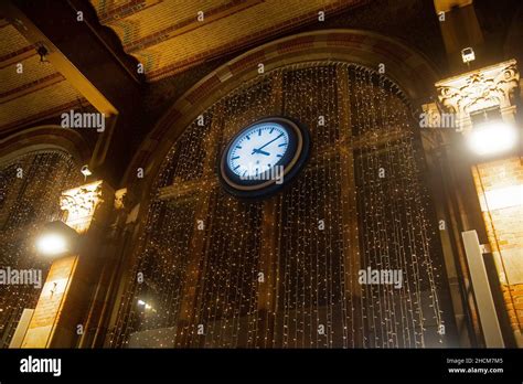 Features and architecture of Amsterdam Central Station in the evening ...