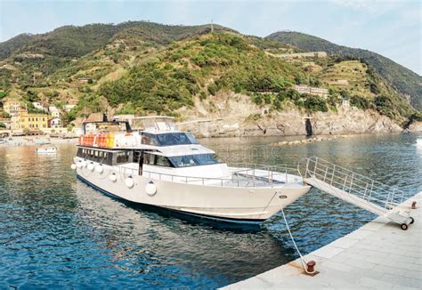 Cruise Boat with Tourists Sailing in Cinque Terre National Park in the ...