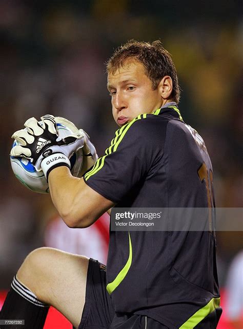 Goalkeeper Brad Guzan of CD Chivas USA catches the ball for a save ...