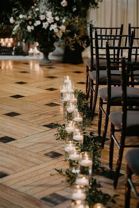 wedding aisle ideas with candles and greenery - EmmaLovesWeddings