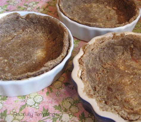 Press dough into individual ramekin or tart dishes, creating a thin ...