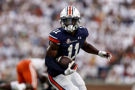 Bigsby leads Auburn ground attack in 42-16 win over Mercer | AP News