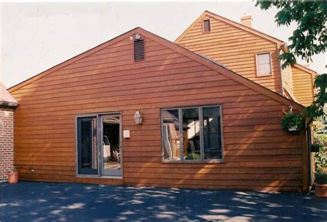 How to Stain Cedar Siding | Contractor Quotes