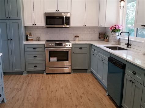 Blue lower white upper cabinets | Painting kitchen cabinets white, Top ...