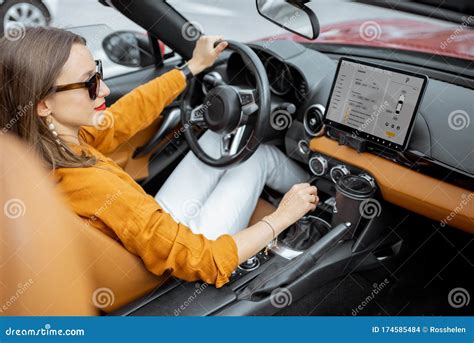 Woman Driving Sports Car with a Digital Touchscreen Stock Photo - Image ...