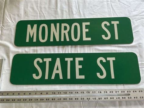 Double sided new street signs - Legacy Auction Company