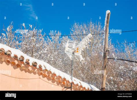 Snow covered rooftop and aerial Stock Photo - Alamy