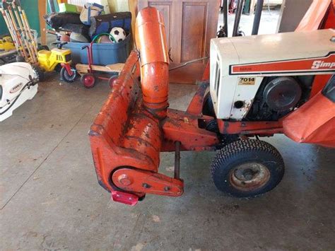 Simplicity lawn tractor with 42-in snow blower and cab - W. Yoder Auction