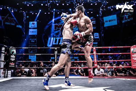 two men in the middle of a boxing ring