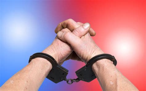 Hands in Handcuffs and Police Lights Stock Photo - Image of rusty ...