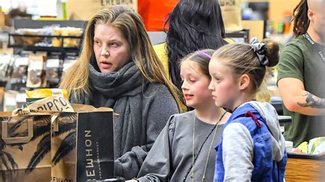 Lisa Marie Presley and Twin Daughters Spotted on Rare Outing: Photos