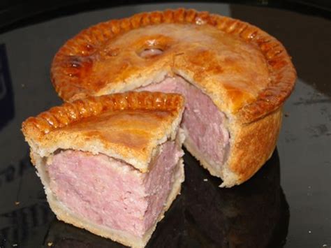 'Pork Pie'. Pork & pork jelly set in a simple hot water crust.Served ...