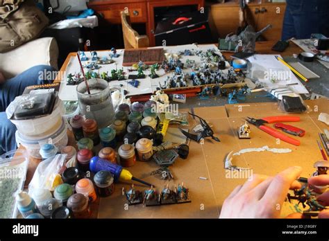 Painting Warhammer lizardmen figures Stock Photo - Alamy