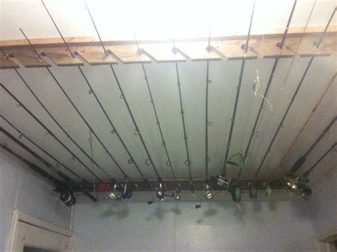 My dad made these ceiling mount fishing rod racks for me. All reclaimed ...