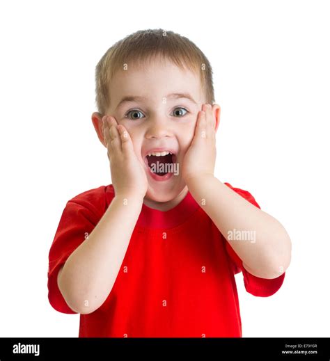 Surprised little boy portrait in red tshirt isolated Stock Photo - Alamy