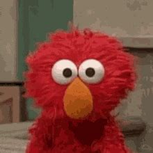 Elmo Shrug GIF - Elmo Shrug Idk - Discover & Share GIFs