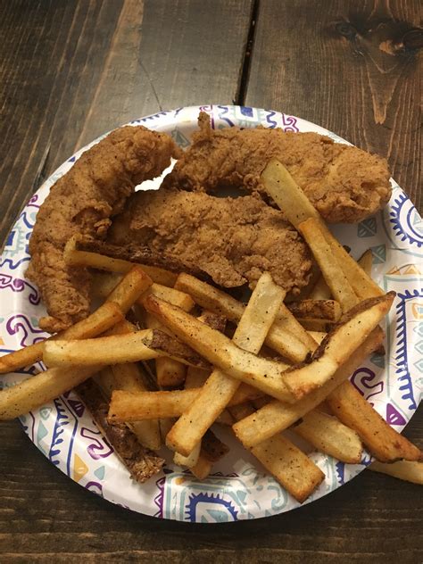 [homemade] Chicken tenders and fries. Fancy plate makes the meal. : food