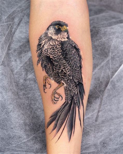 Share 79+ small falcon tattoo - in.coedo.com.vn