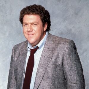 George Wendt as Norm Peterson on Cheers