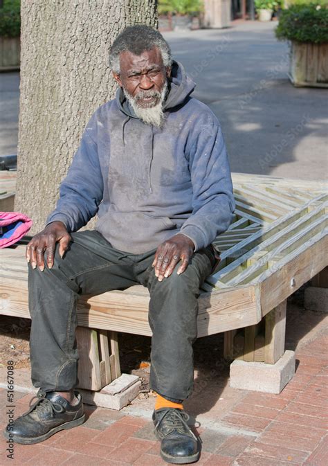 Poor old African american homeless man Stock Photo | Adobe Stock