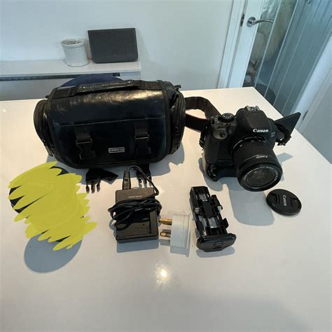 Canon 700D + 1 lens / battery grip / 2x batteries... - Depop